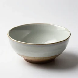 obsidian ceramic mixing bowl, commercial catalog photo, isolated on a pure white background, centered, entire object in frame, sharp focus, soft studio lighting