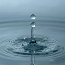 a water drop ultra realistic before touching water