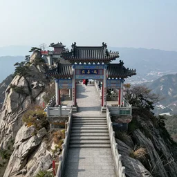 a view of gateway to temple on the top of mountain, shan - shui