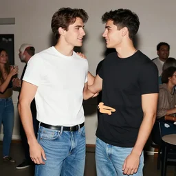 a very handsome young man is flirting with another very handsome young man at a party. jeans and tshirt