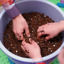 a pot full of lego raw mince being mixed up by hands, pov, vaporwave