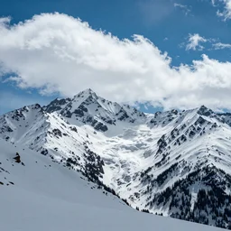 tall mountains covered in snow with huge clouds, photo by Ansel Adams,