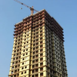 a building, under construction, made of gold