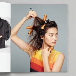 a fashion model curls her hair using hot dogs. surreal photograph, toiletpaper magazine, 3 5 mm photograph, colourful, by pierpaolo ferrari, maurizio cattelan