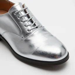 product shot of a new shoe. shiny, high quality 4 k, soft lighting, intricate, detailed, photo