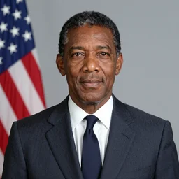 upper body portrait of the united states president wearing a suit and tie, black man, a character portrait by frank barrington craig, reddit, precisionism, 1 9 7 0 s, provia, studio portrait