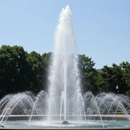 a tall white fountain played