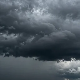 dark impending clouds, beginning to rain