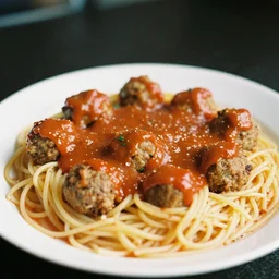 a photograph of Mark Zuckerberg made out of spaghetti noodles, covered in sauce and meatballs, 50mm lens, 35mm film, f4