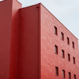 brutalist building fully covered in thick red paint